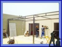 Cerramientos para cocheras y garages de fabrica en fibrofacil y chapa.